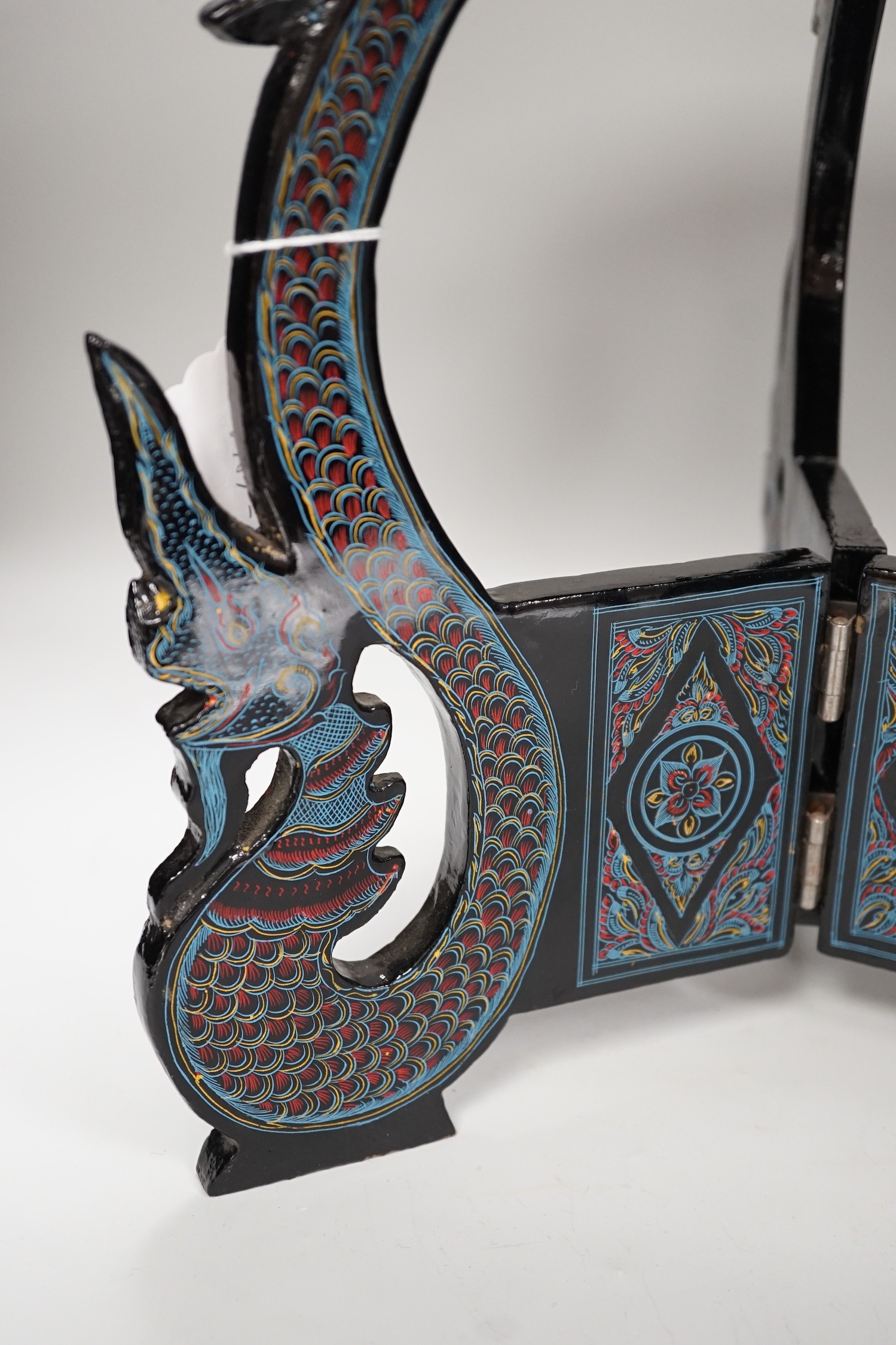 A Burmese lacquered dish and stand, 38cm tall